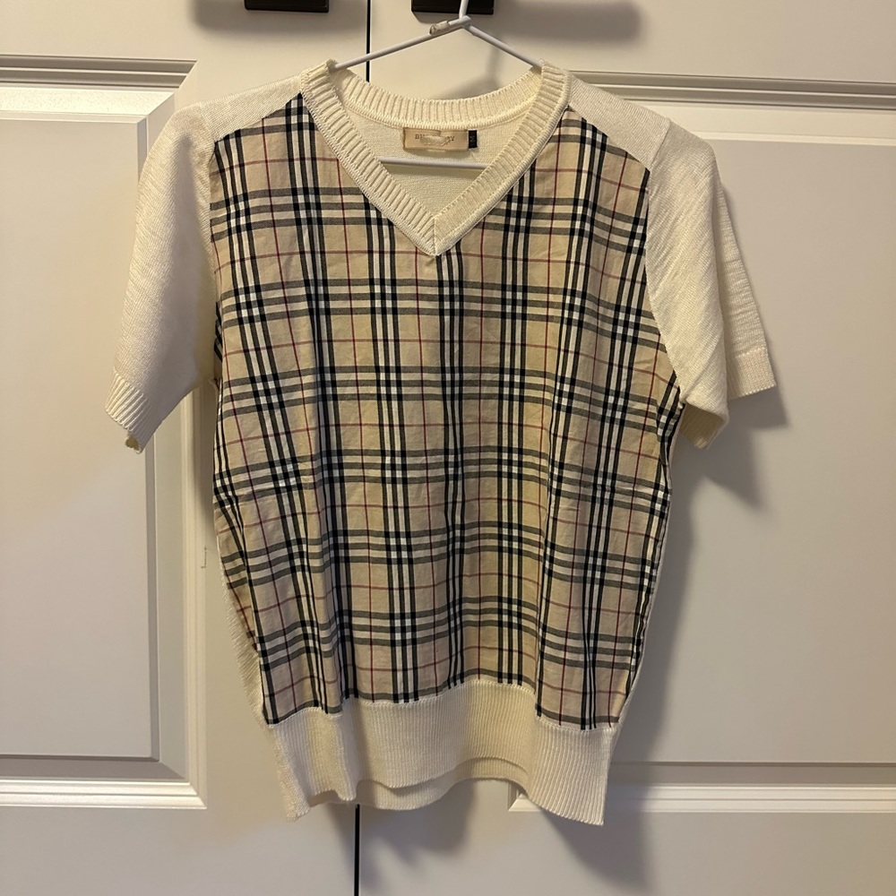 Burberry V neck short sleeve plaid and cream sweater. Size M.